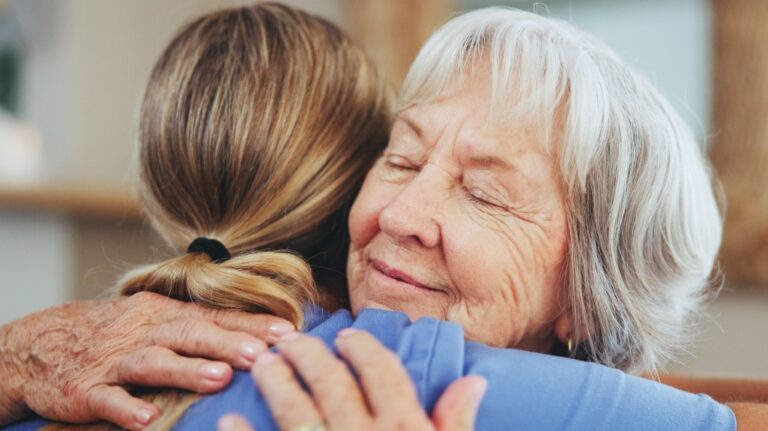 happy grandma hugging her daughter