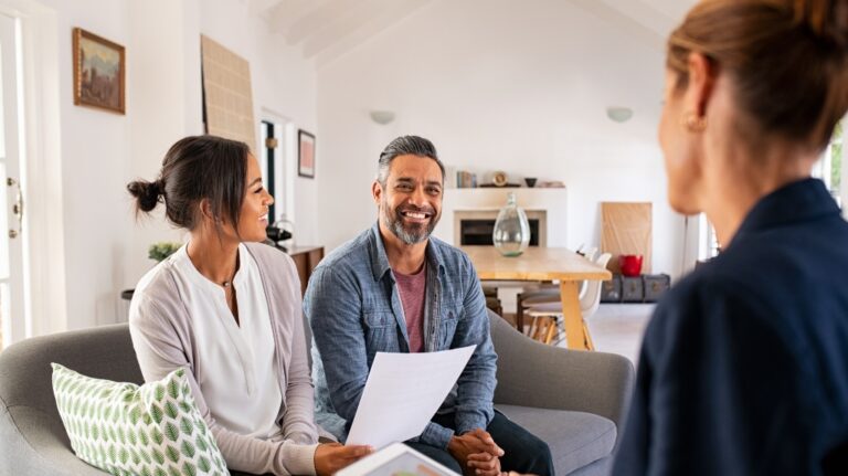 Happy mature couple discussing estate planning