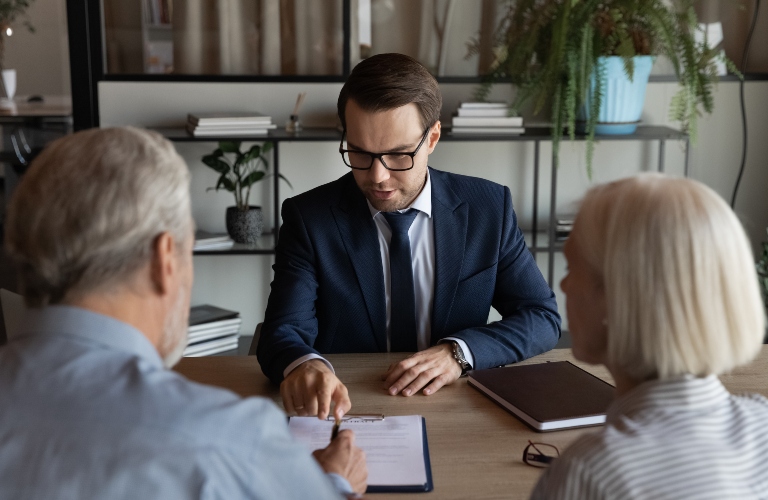 lawyer consulting senior couple