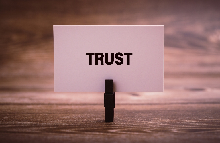Trust word written in the paper