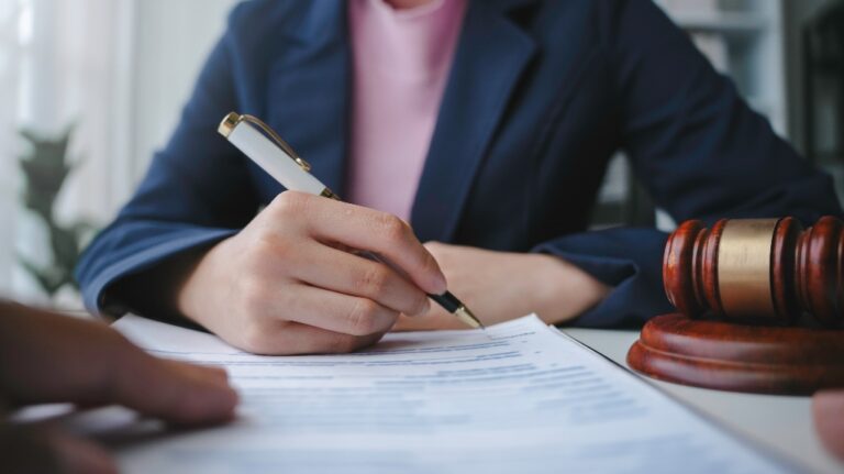 lawyer is signing document