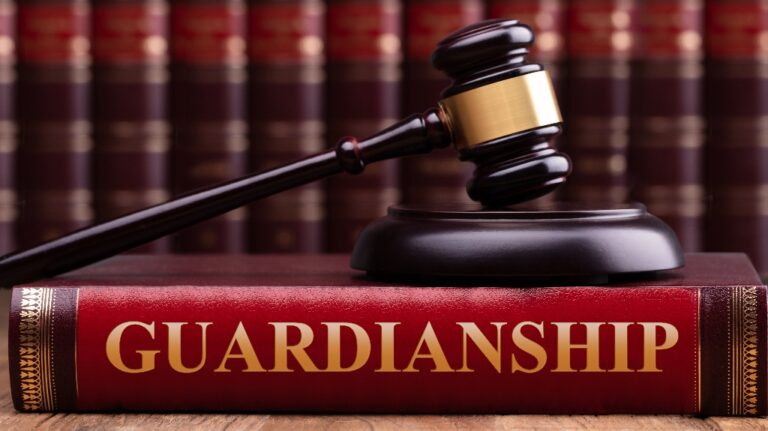 Judge gavel and striking block over law book with Guardianship text