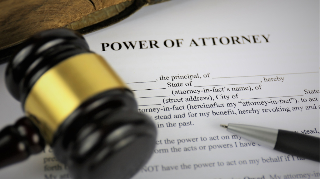 Power of attorney document and judge's gavel